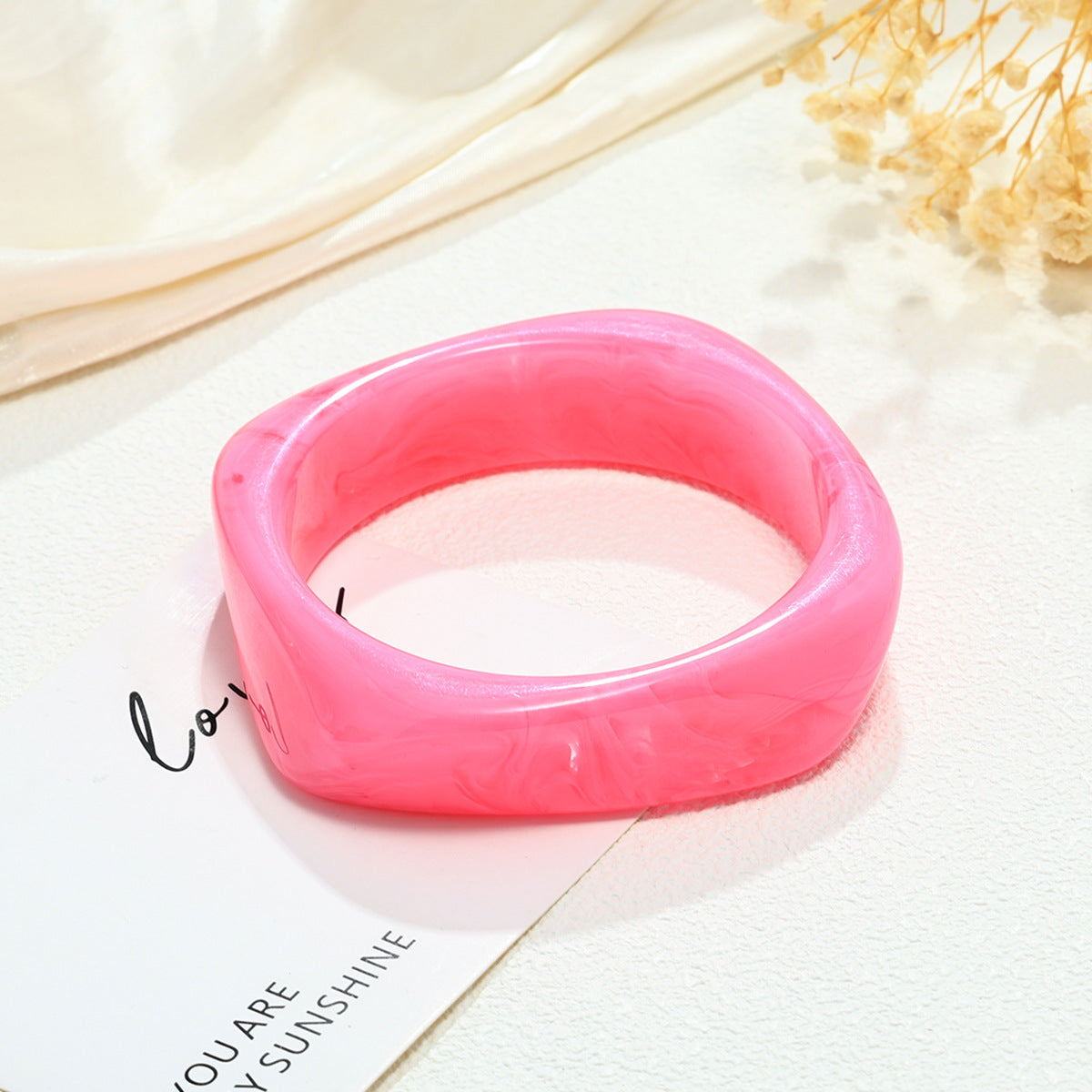 Geometric Coffee Resin Bracelet
Modern Elegance in Every Curve